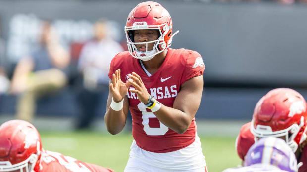 Razorbacks backup quarterback Jacolby Criswell takes a snap in season opener Saturday